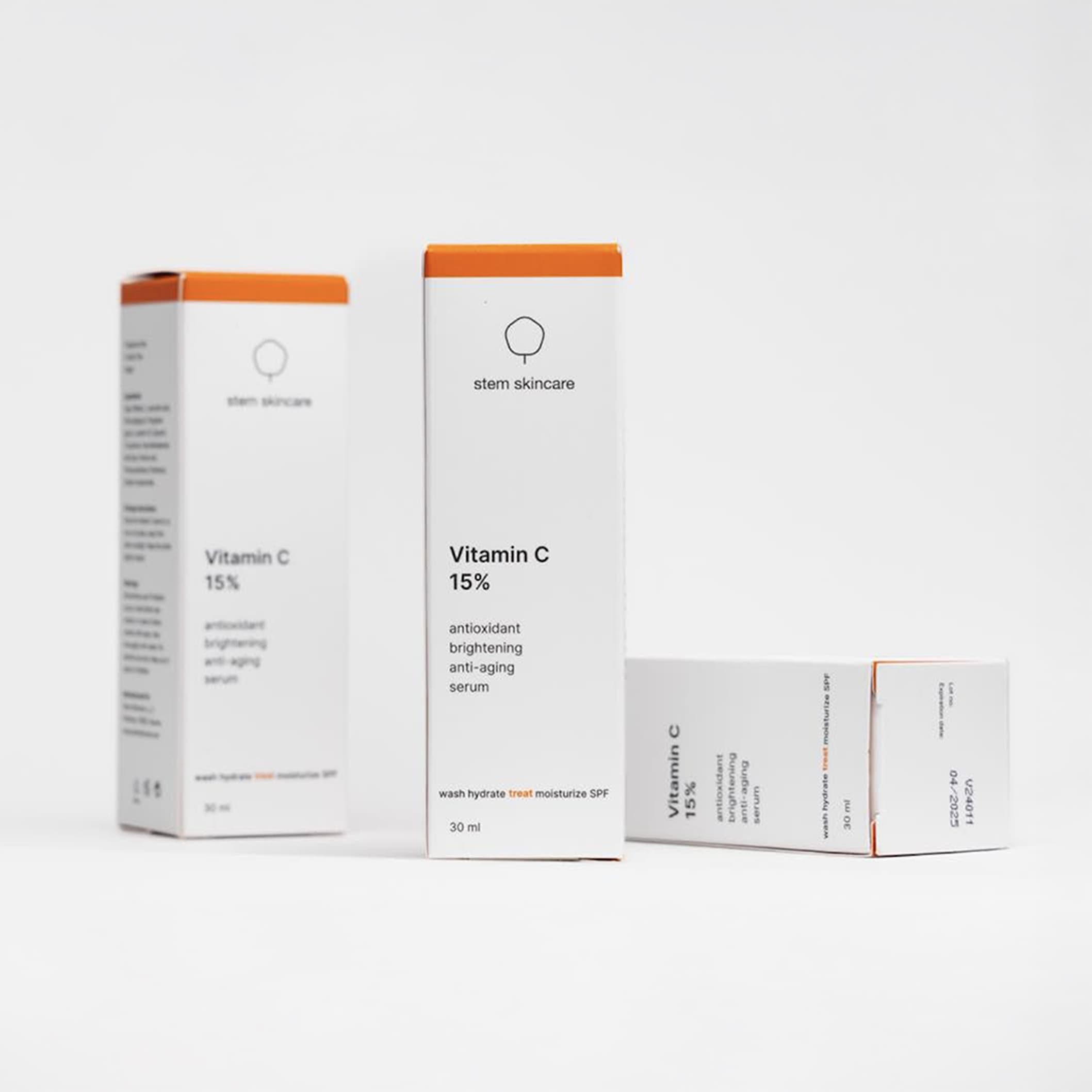 Three Stem Skincare Vitamin C 15% serum boxes photographed in soft natural light against a clean white background.